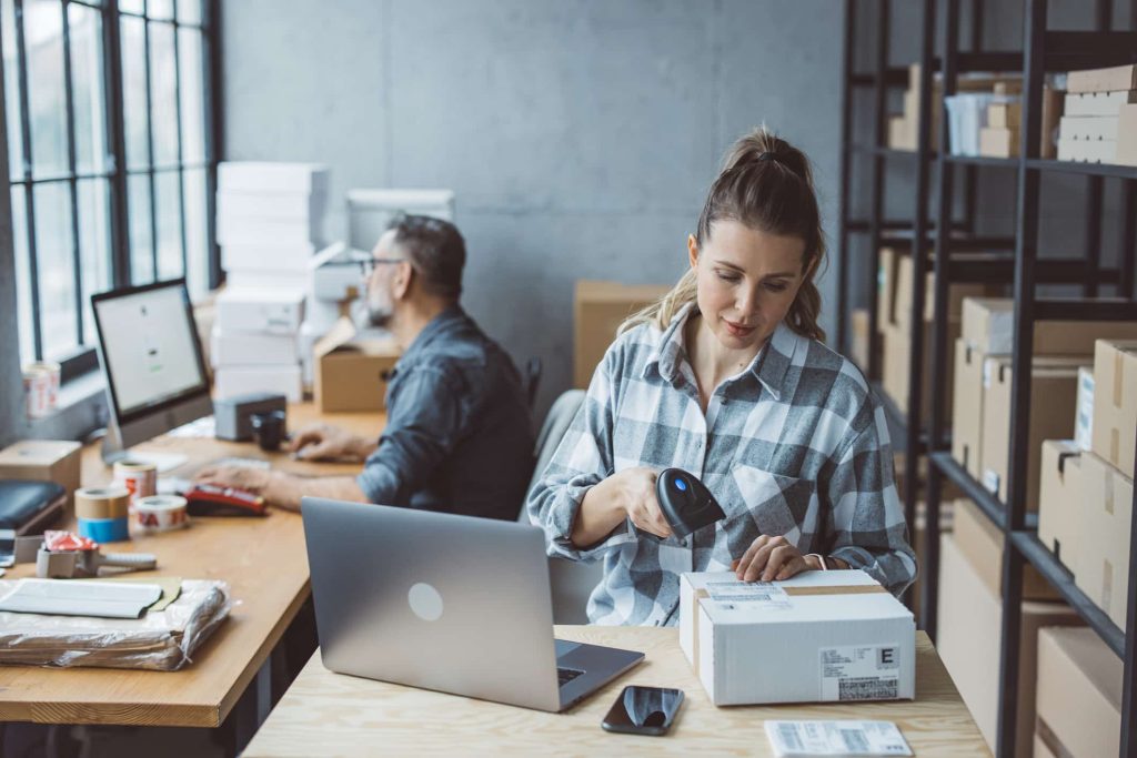 Two business partners considering grouping multiple businesses
