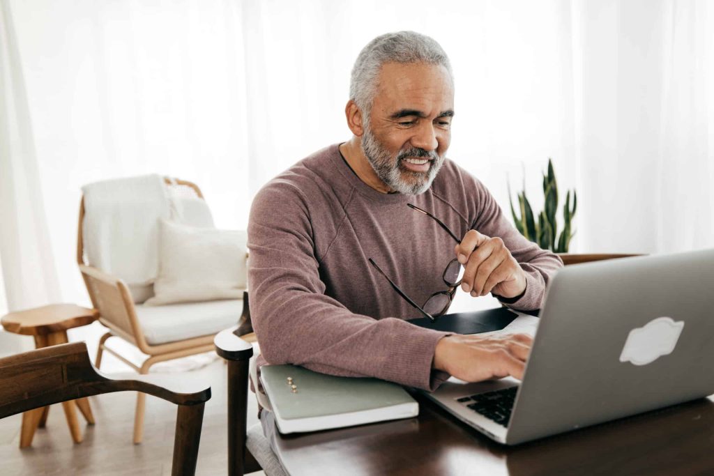Senior man looking up his Health Savings Account