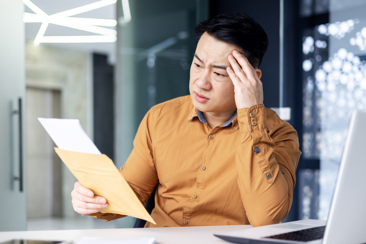 Man reading about IRS Penalties & Strategies for Relief