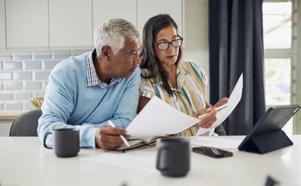 A couple reviewing Top Sole Proprietorship Retirement Plans